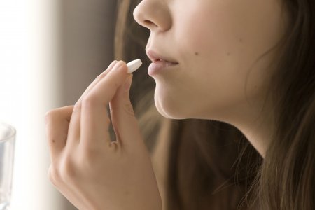 Woman taking medication